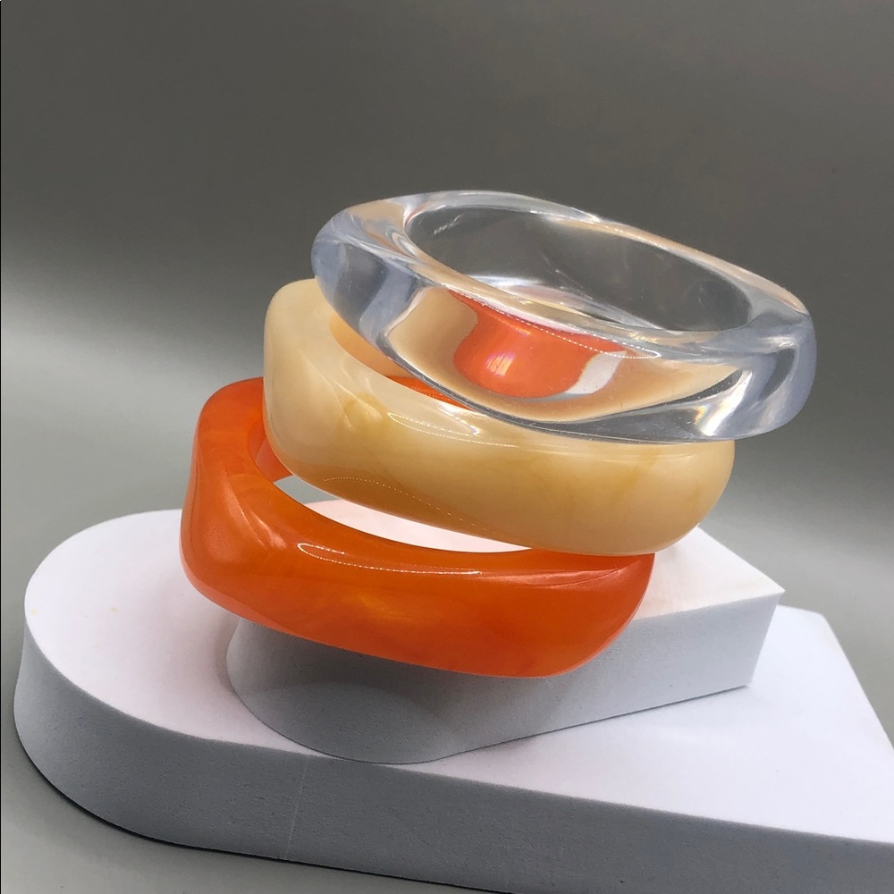 Bundle 3 thick acrylic bangle bracelets stackable layering statement look.